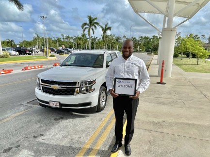 Driver-greeting-guests-Airport